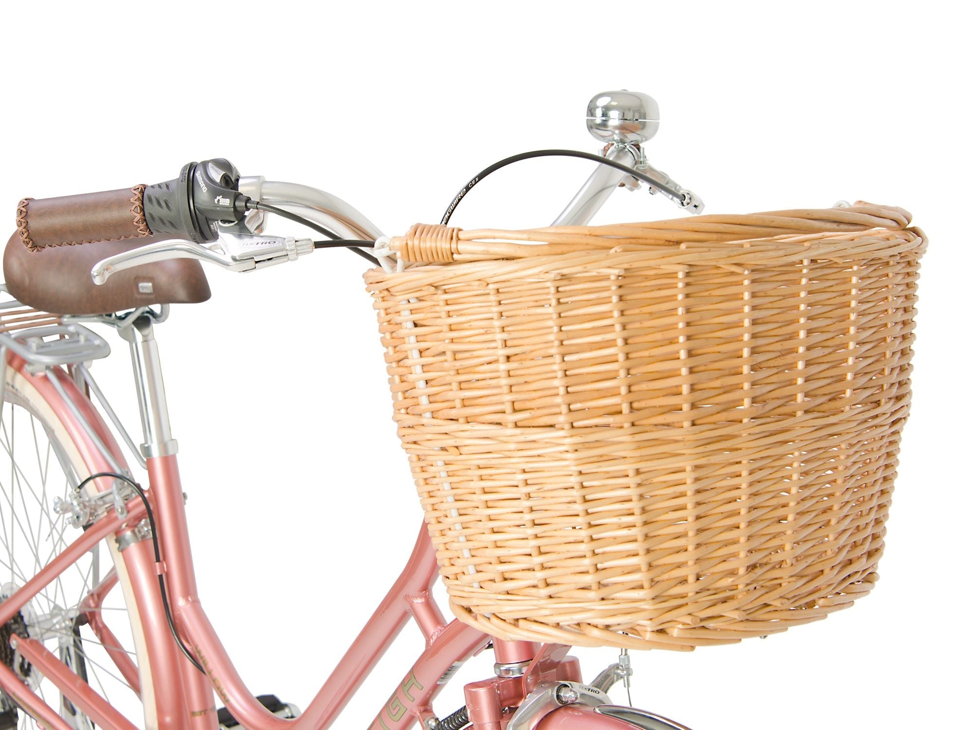 Pink ladies bike store with wicker basket